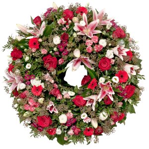 Stargazer lilies and Roses funeral wreath